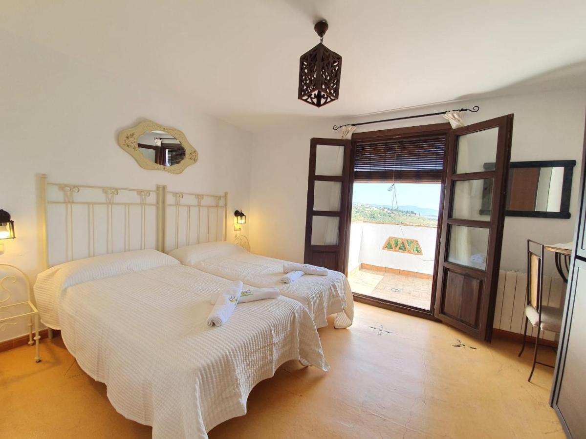 Quarto Quádruplo com Varanda