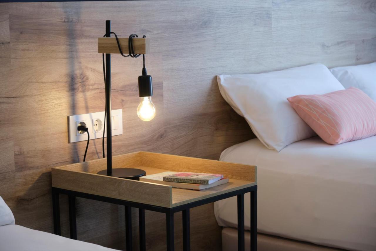 Quarto Triplo com Varanda