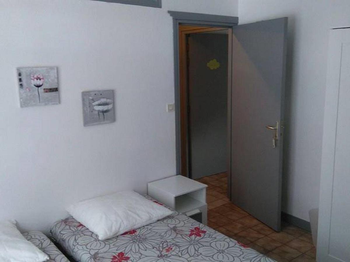 Chambre Quadruple avec Salle de Bains Commune