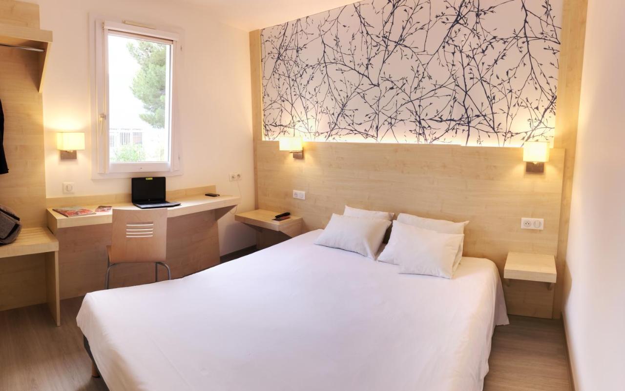Chambre Quadruple avec 1 Lit Double et 2 Lits Simples