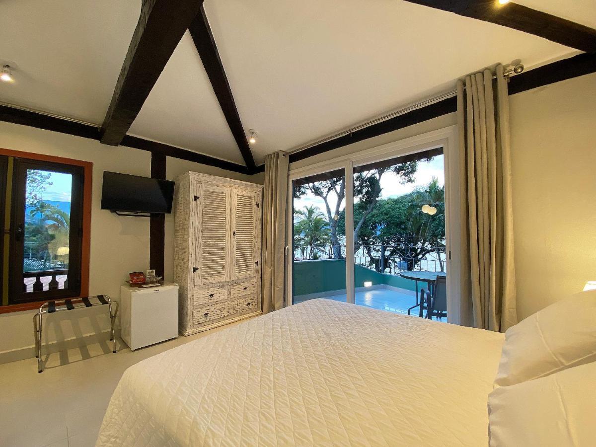 Quarto com Cama Queen-size e Vista do Mar