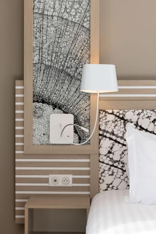Chambre Lits Jumeaux avec Balcon - Vue Partielle sur Mer