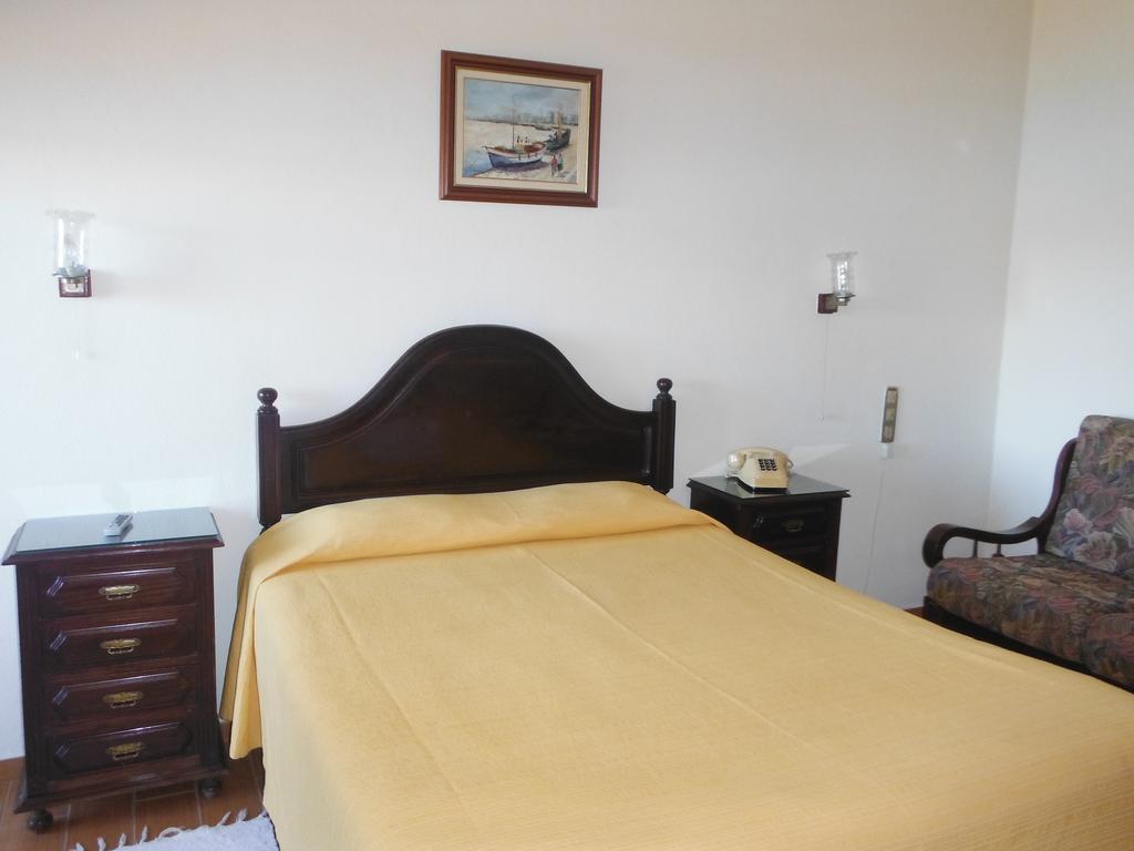 Quarto Duplo com Varanda e Vista Lateral