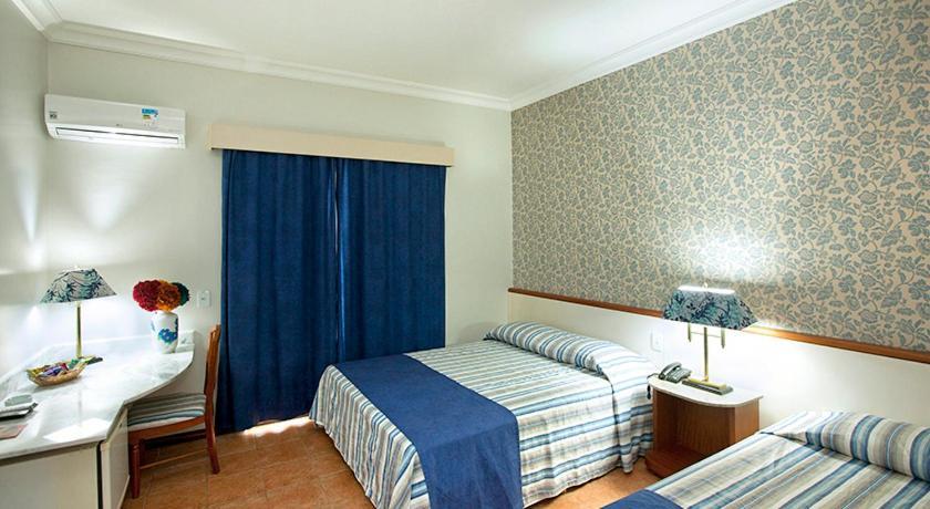 Quarto Duplo com Varanda - 2 Camas de Solteiro