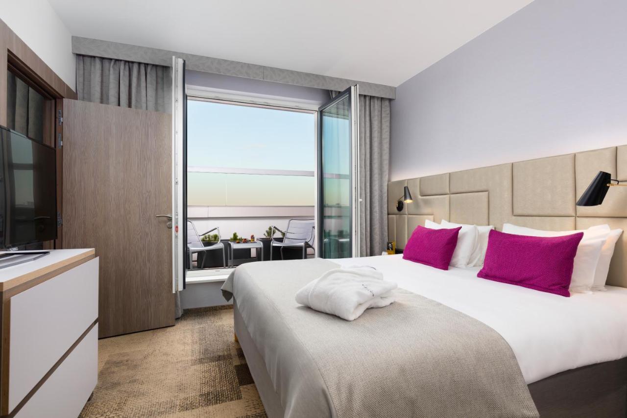 Executive Suite met Queensize Bed en Terras