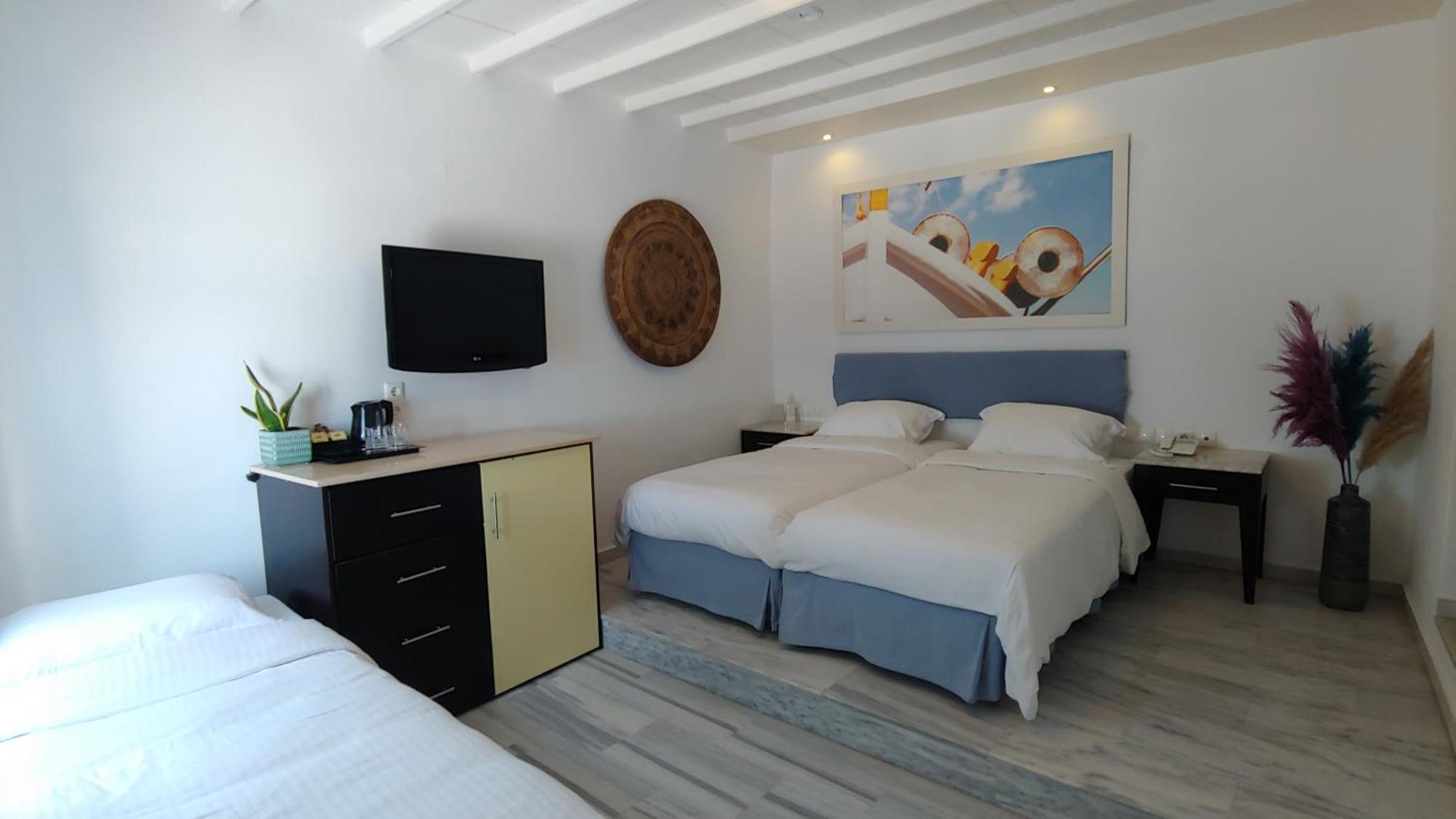 Quarto Triplo Superior com Vista Mar