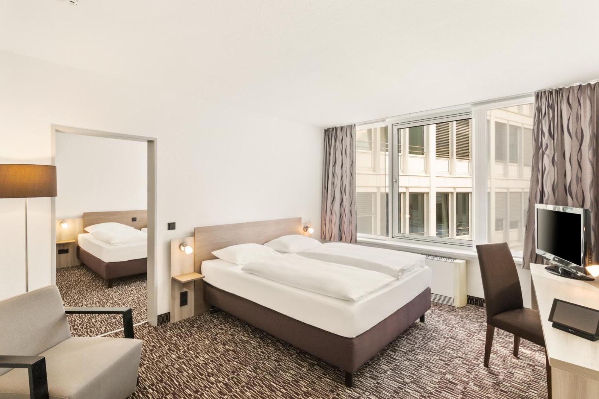 Two-Room Family Room with One Double and Two Single Beds,1212075448:JPEG