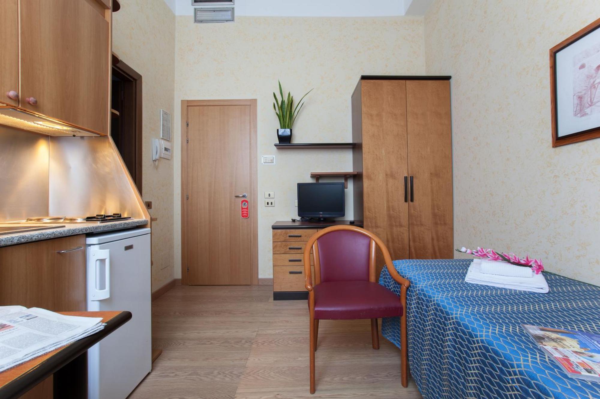 Quarto Individual com Kitchenette