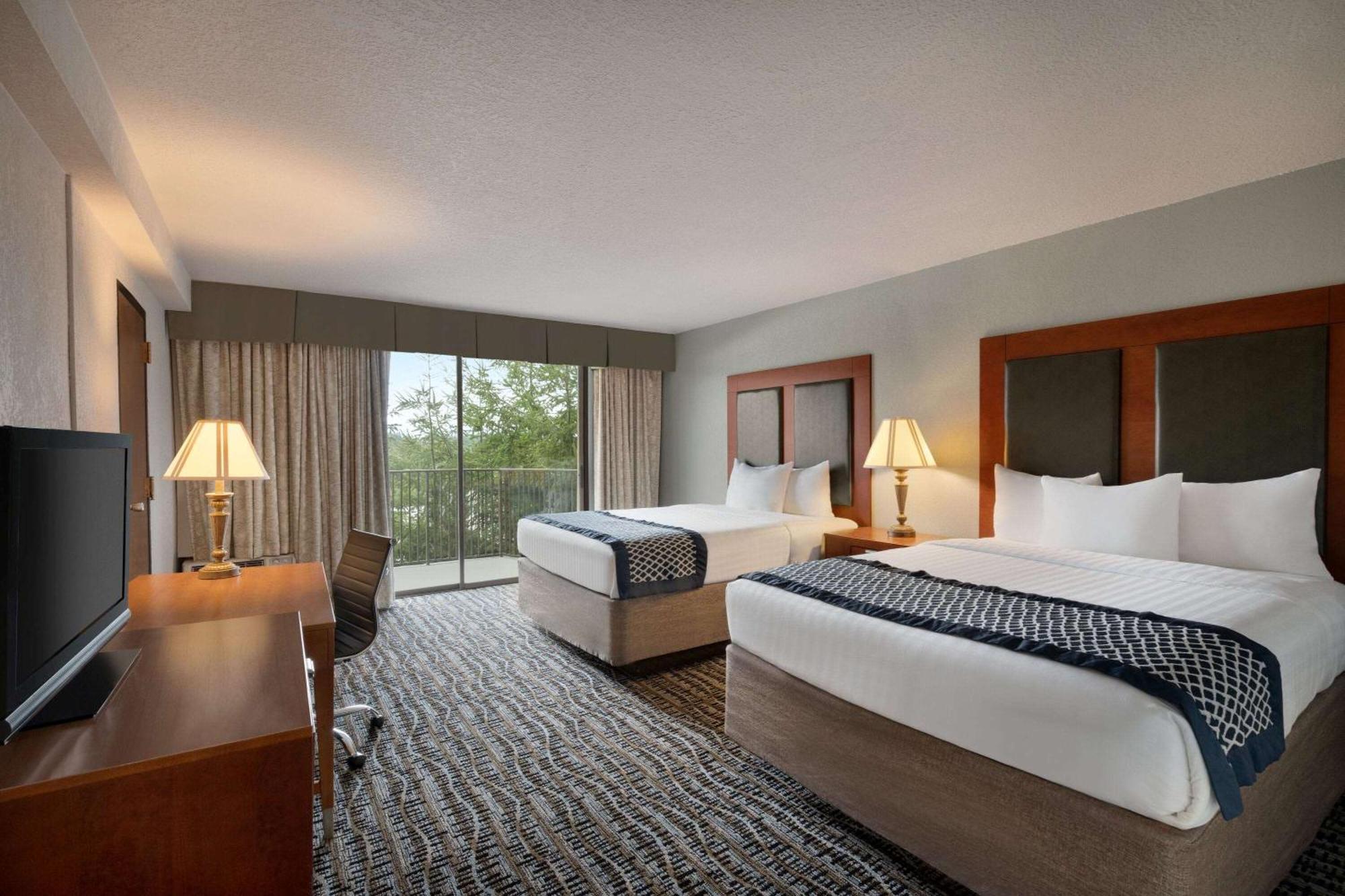 Queen Room with Two Queen Beds and Street View - Non-Smoking