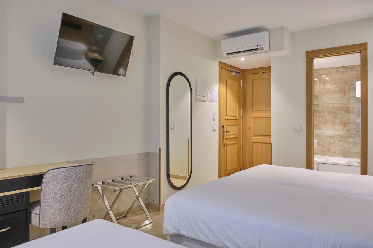Quarto Duplo com Cama Extra