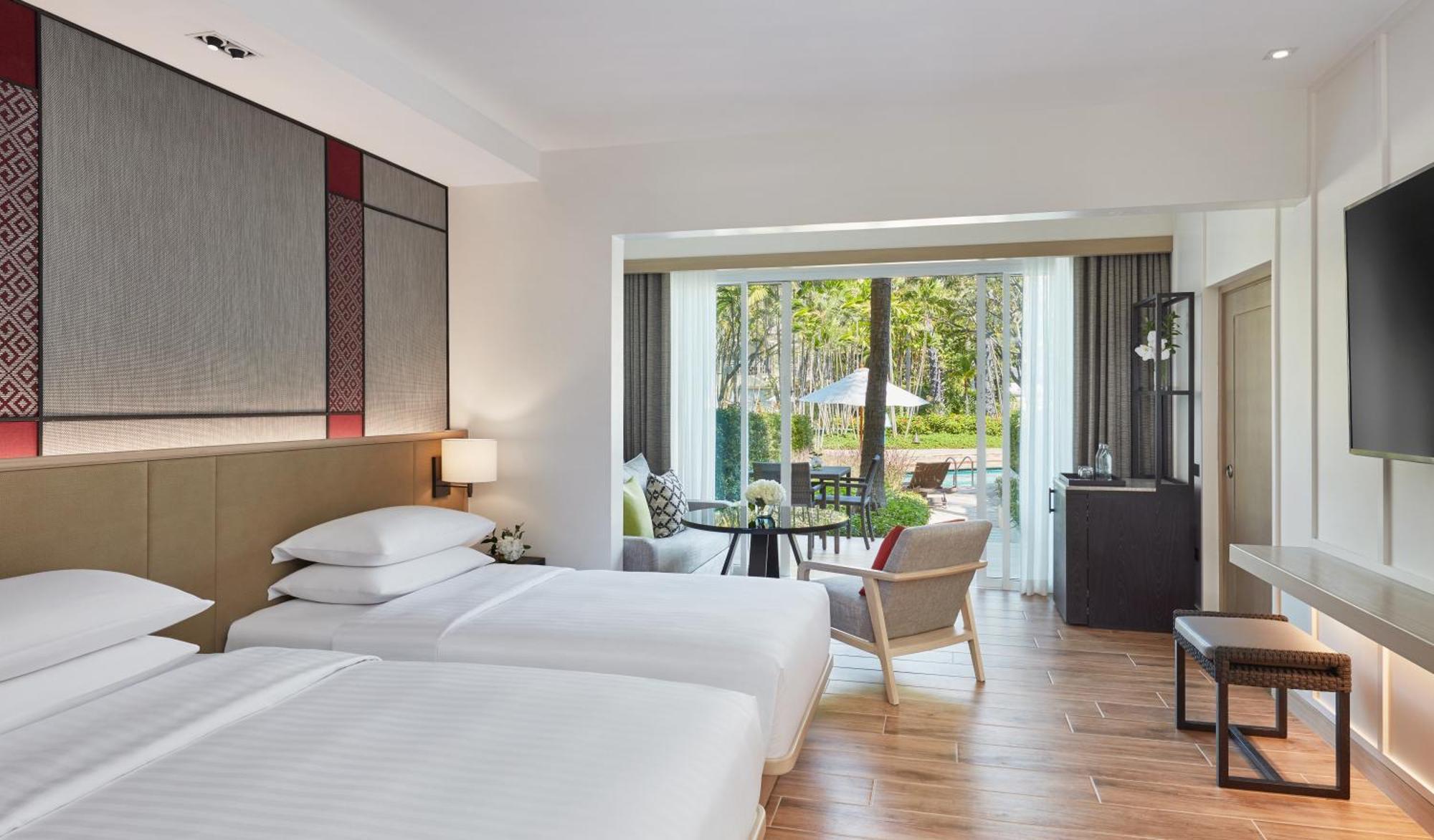 Zweibettzimmer mit Zugang zum Pool