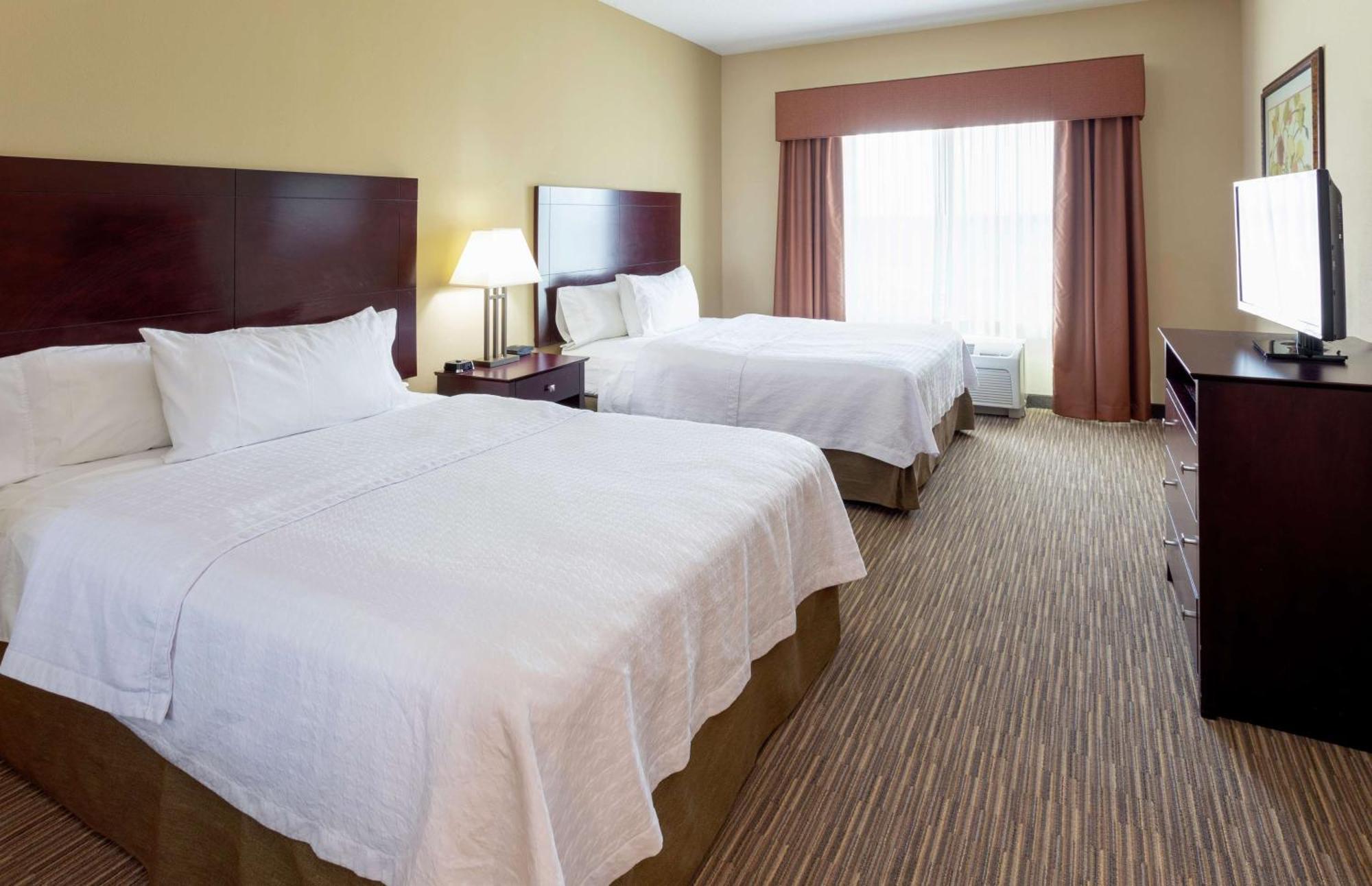 Two Bedroom Suite with One King and Two Queen Beds - Non-Smoking