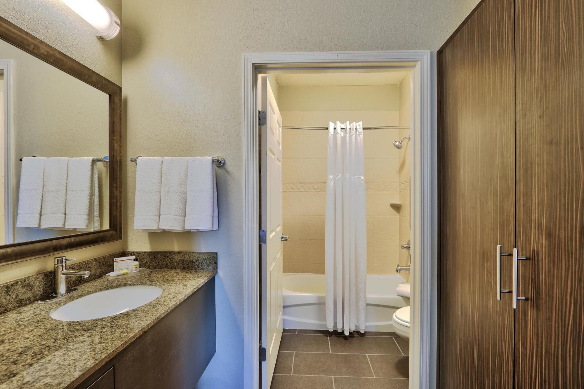 Two-Bedroom Suite with One King Bed and Two Queen Beds