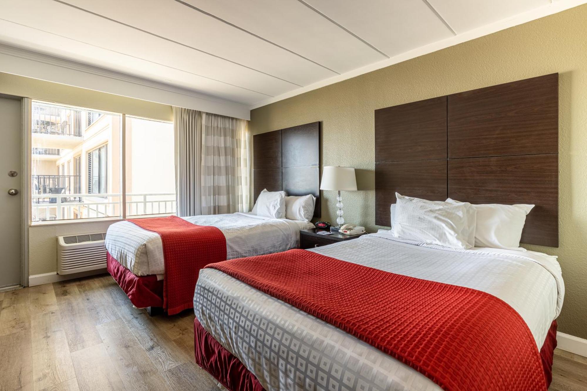 Room Two Double Beds Partial Ocean View