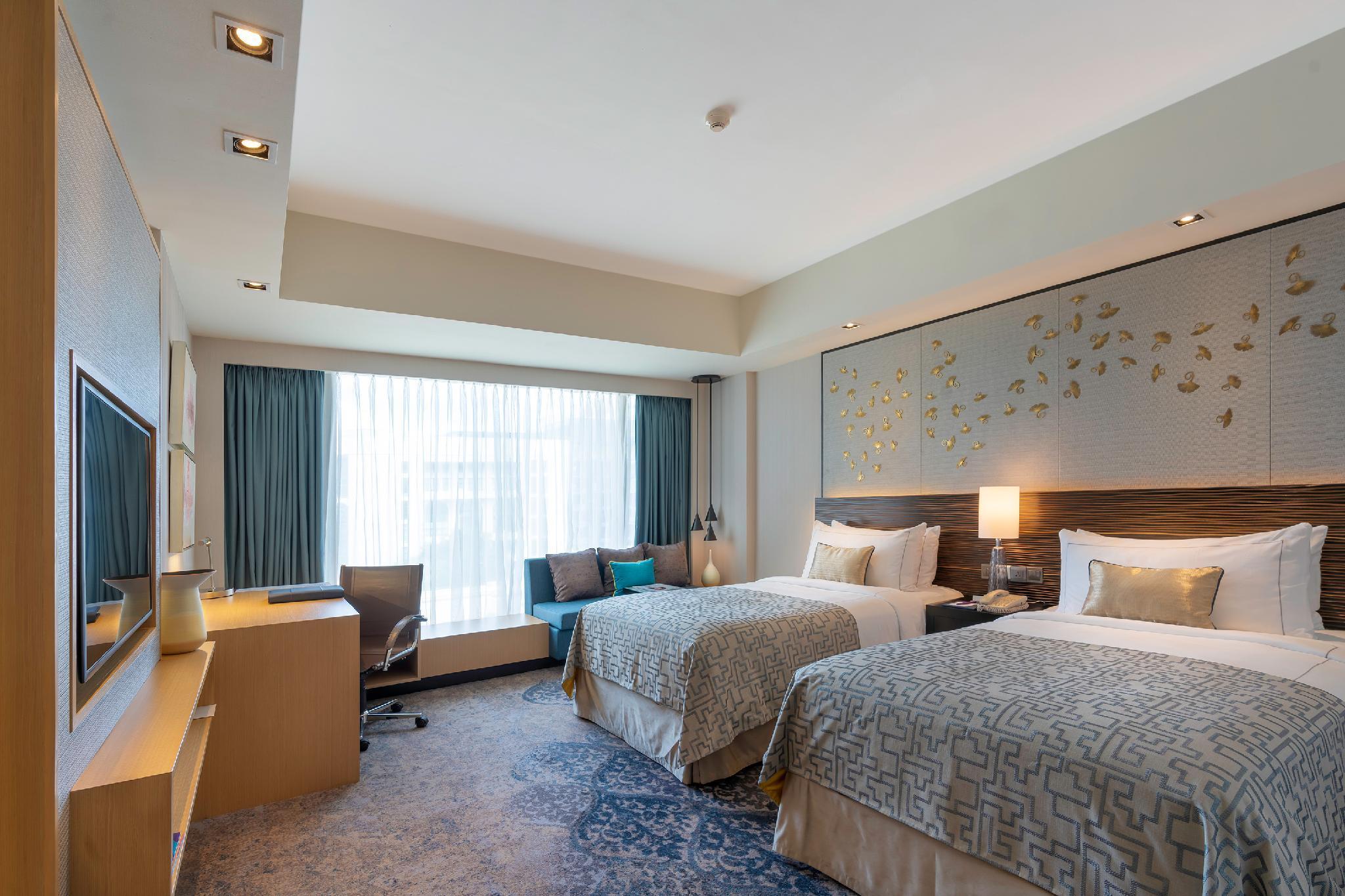 Luxe Tweepersoonskamer met 2 Bedden - Uitzicht op Zee