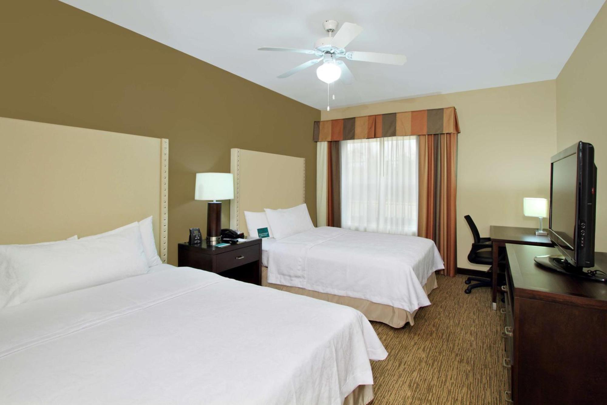 Two Bedroom Suite with One King and Two Queen Beds - Non-Smoking