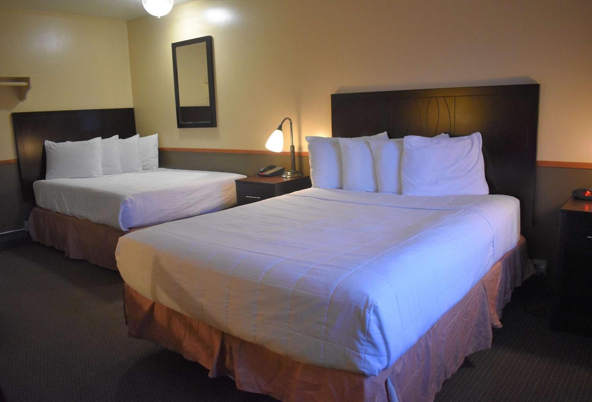 Room with One Queen and One Double Bed