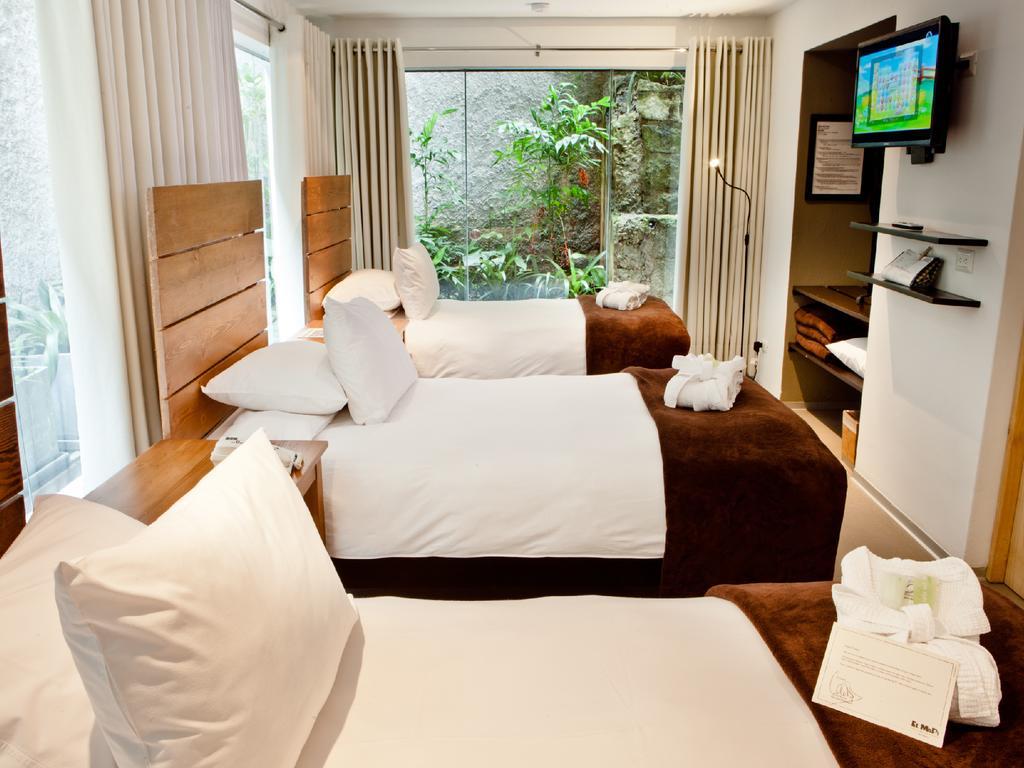 Quarto Deluxe com Cama de Casal ou 2 de Solteiro