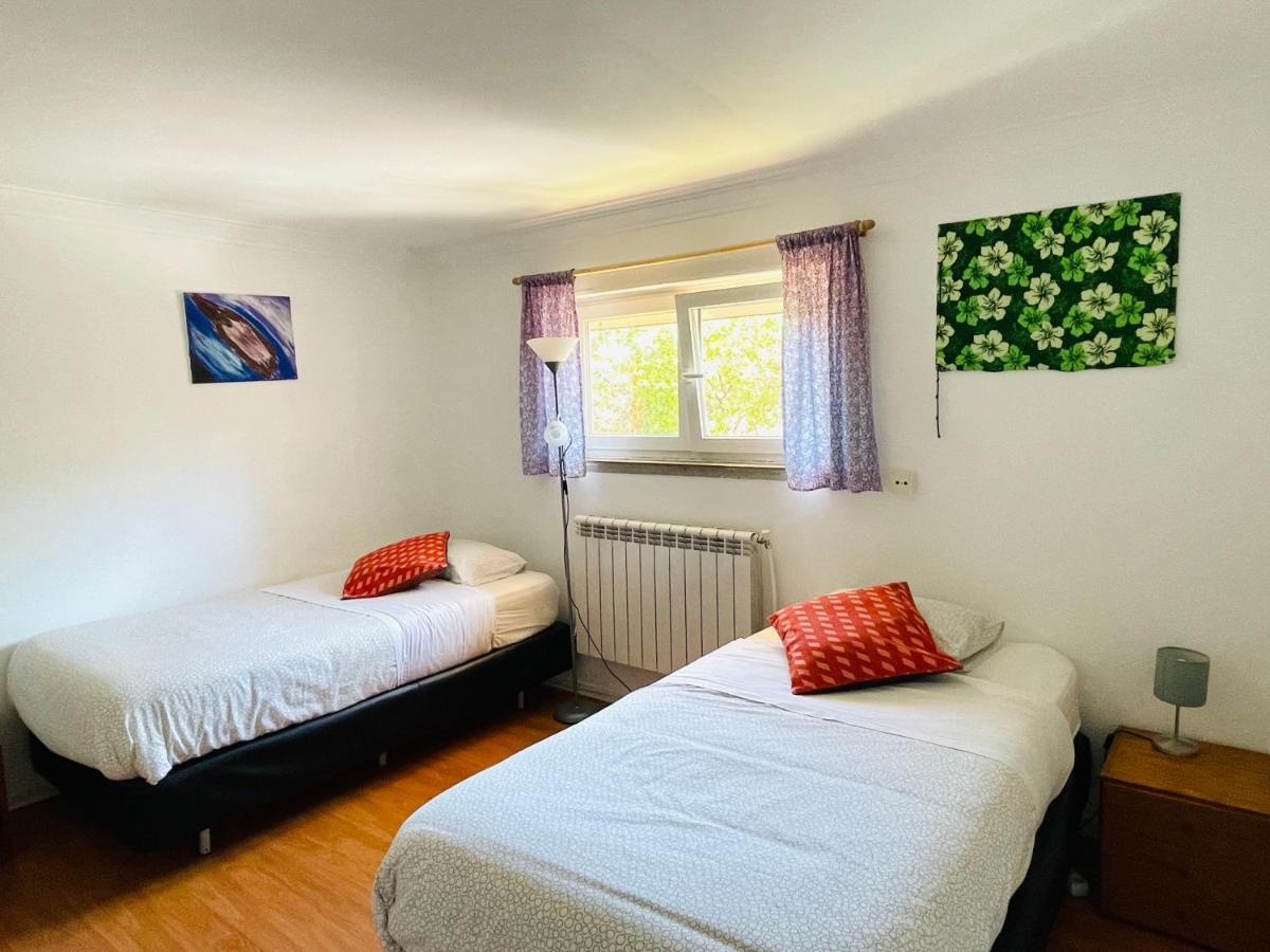 Quarto Triplo com Casa de Banho Partilhada