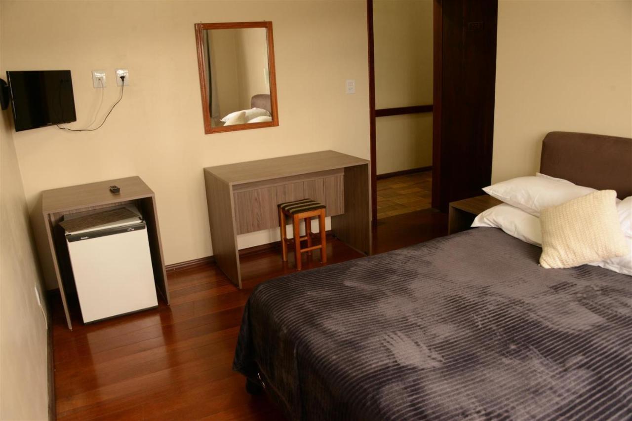 Quarto com Cama Queen-size