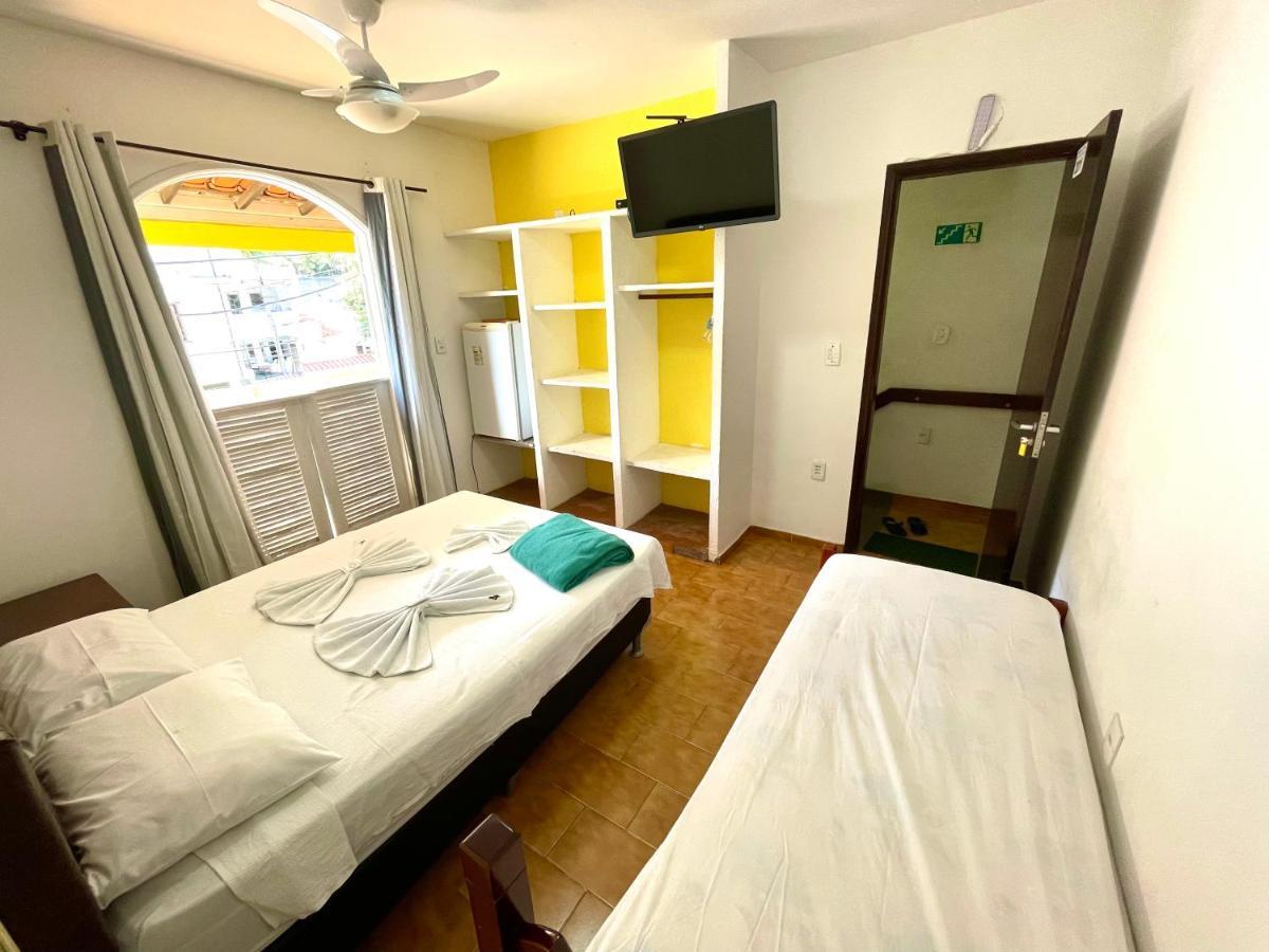 Quarto Triplo com Varanda