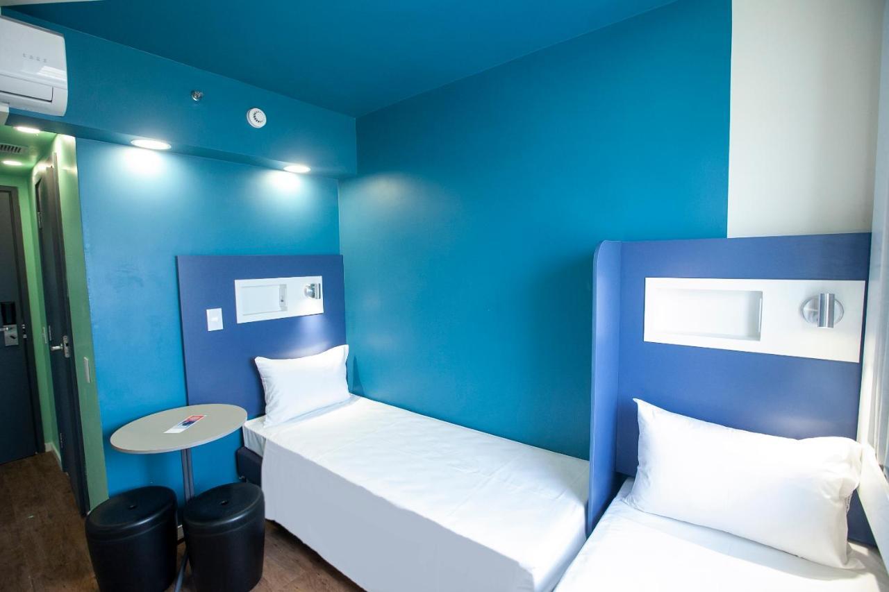 Quarto Superior com 2 Camas de Solteiro e Vista do Oceano