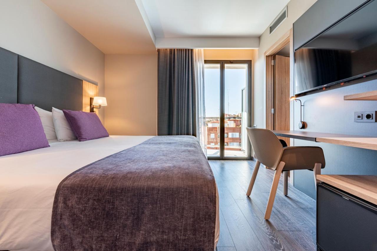 Habitación Doble con vistas a la ciudad y balcón