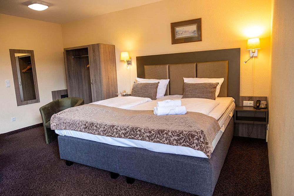Deluxe Zimmer mit Kingsize-Bett
