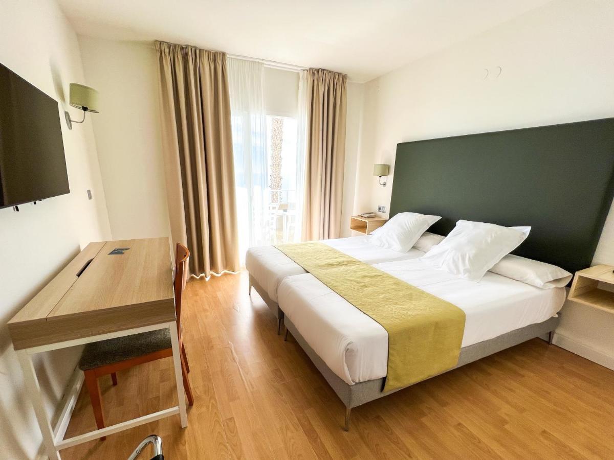 Habitación Doble con cama supletoria (2 adultos + 1 niño)