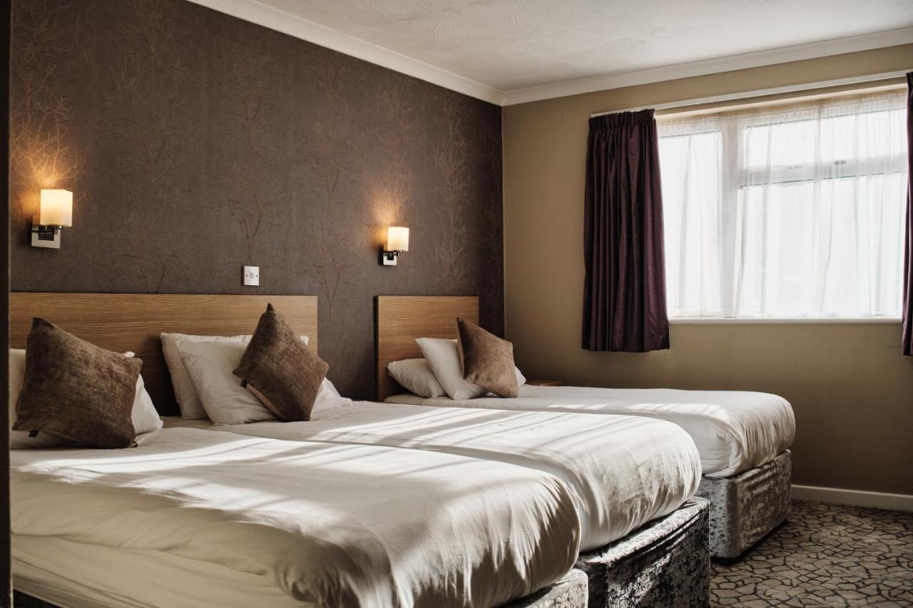 Chambre Triple (2 Adultes & 1 Enfant)