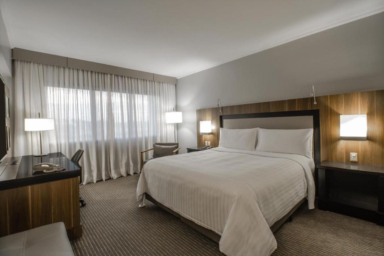 Quarto Executivo com Cama King-size e Acesso ao Lounge