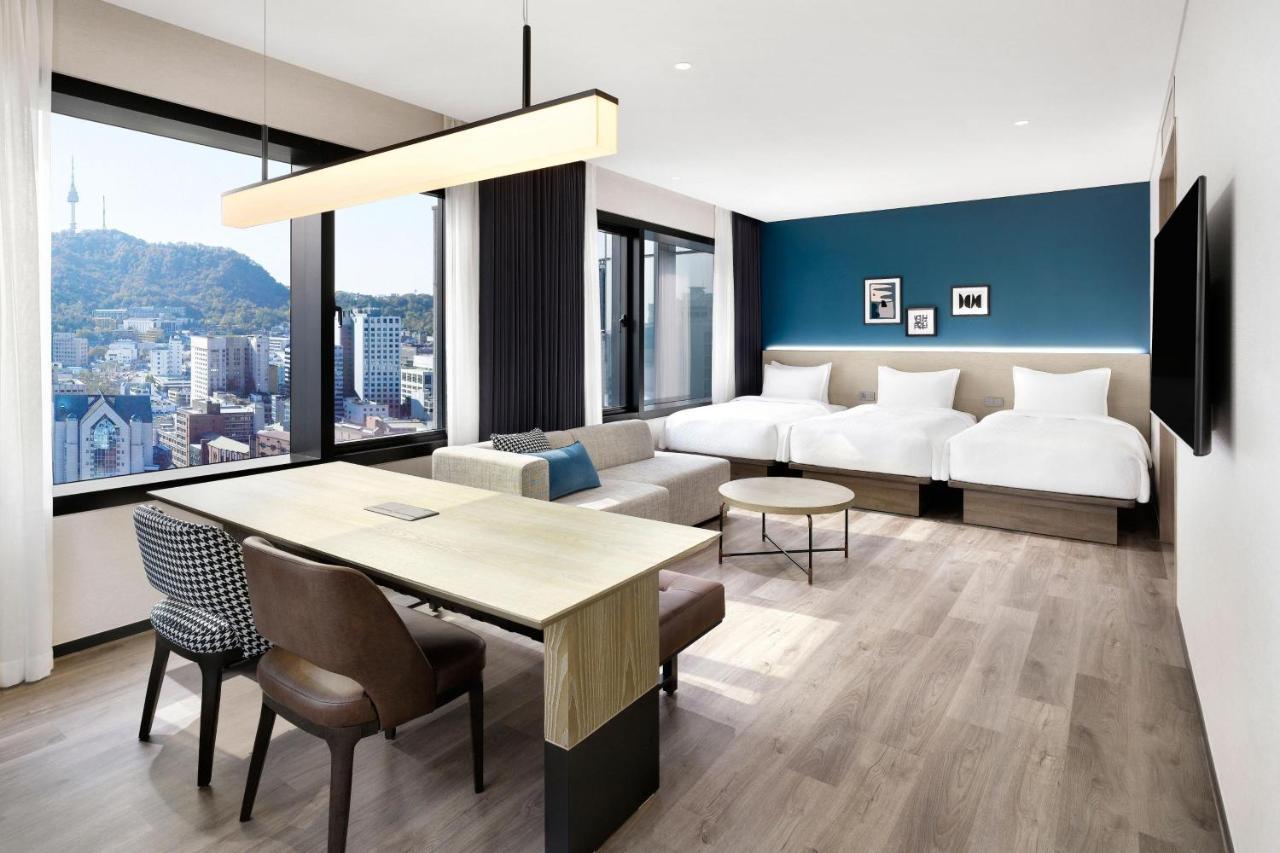 Chambre Premier avec 3 Lits Jumeaux - Vue sur Ville