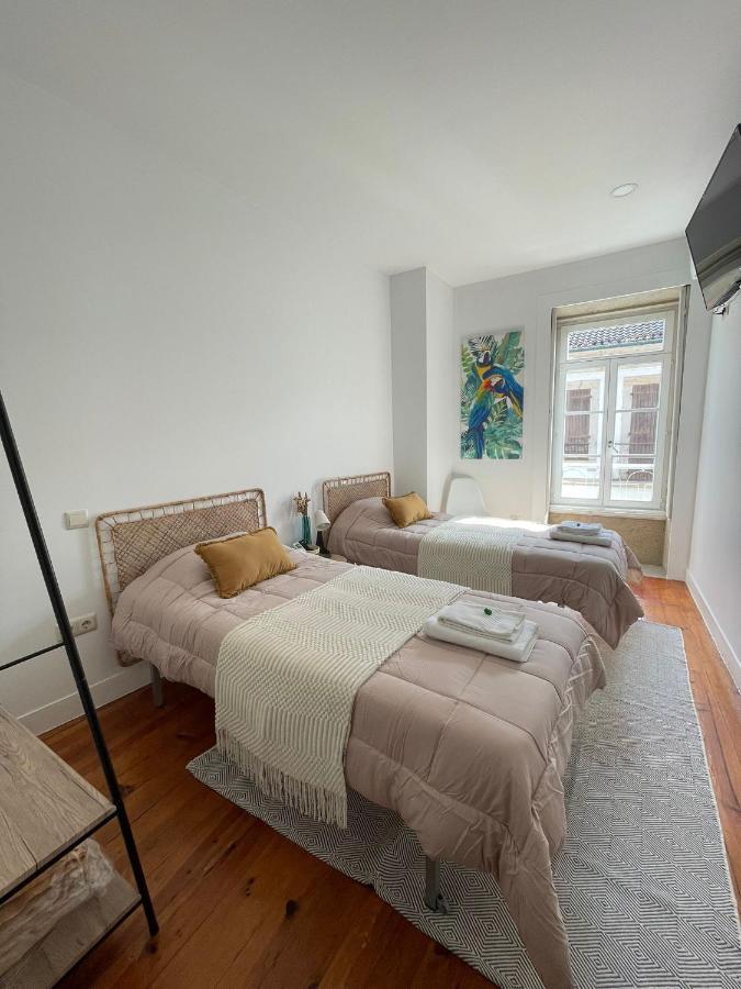 Quarto Twin Standard com Casa de Banho Partilhada