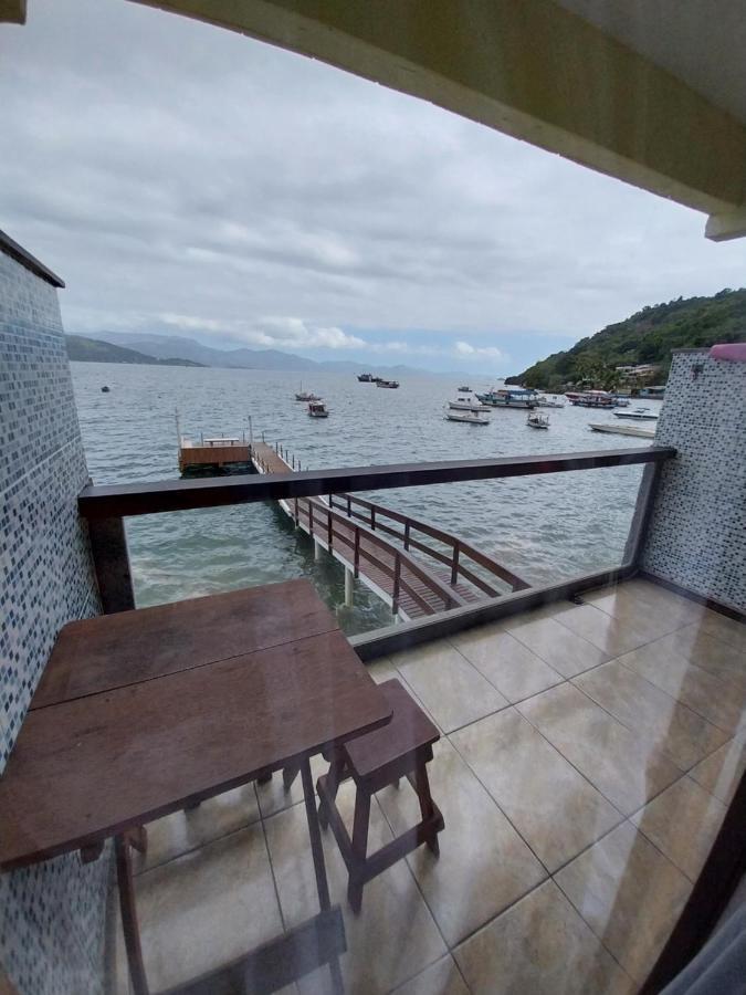 Quarto Quádruplo com Vista do Mar.