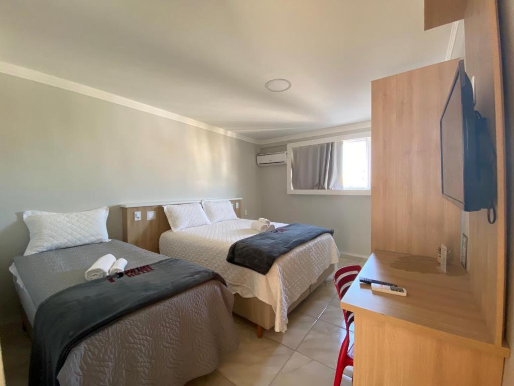 Quarto Duplo
