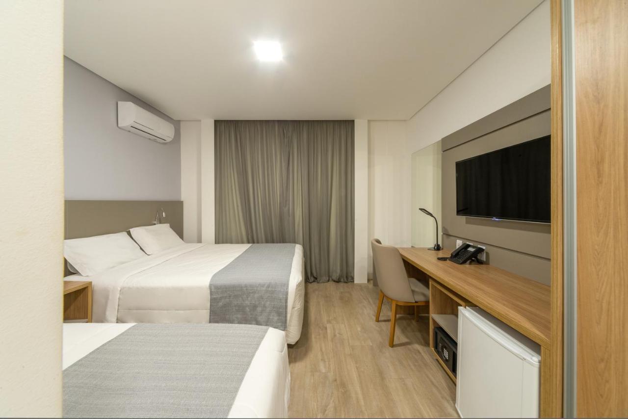 Quarto Triplo Luxo