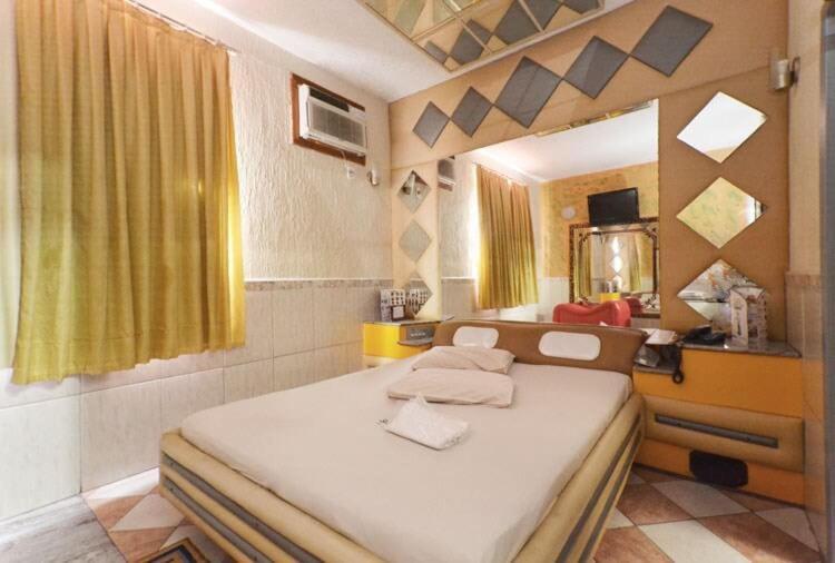 Quarto Superior com Cama Queen-size