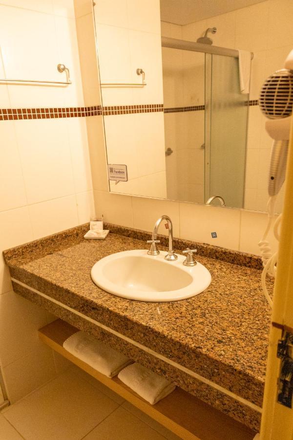 Quarto Triplo Executivo