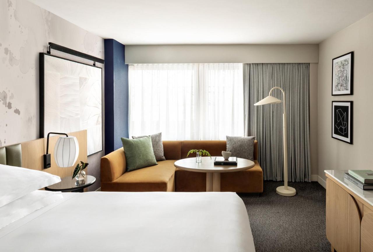 Habitación Essential con 1 cama extragrande y bañera - Adaptada para personas con movilidad reducida