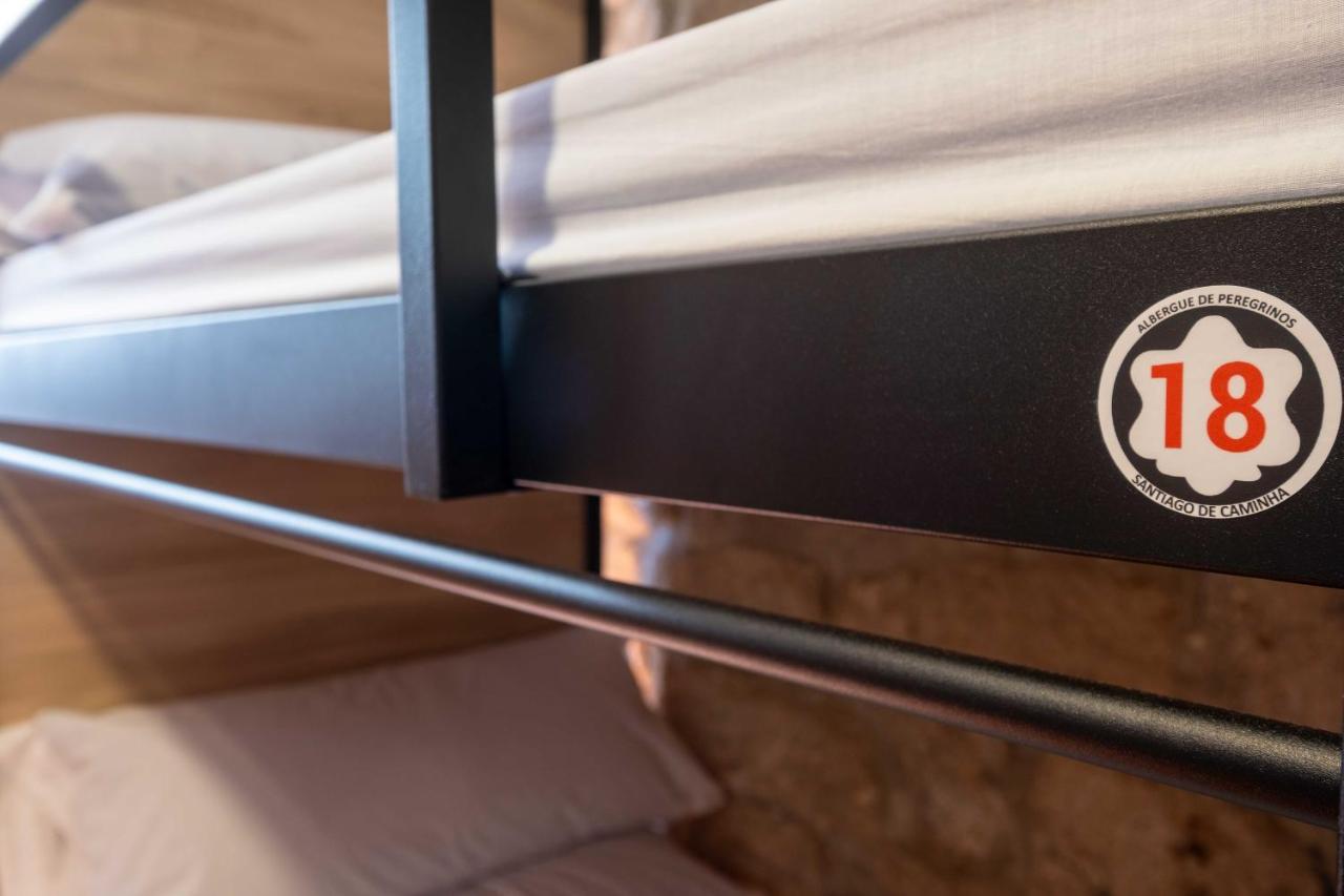 Cama em Beliche num Dormitório Misto