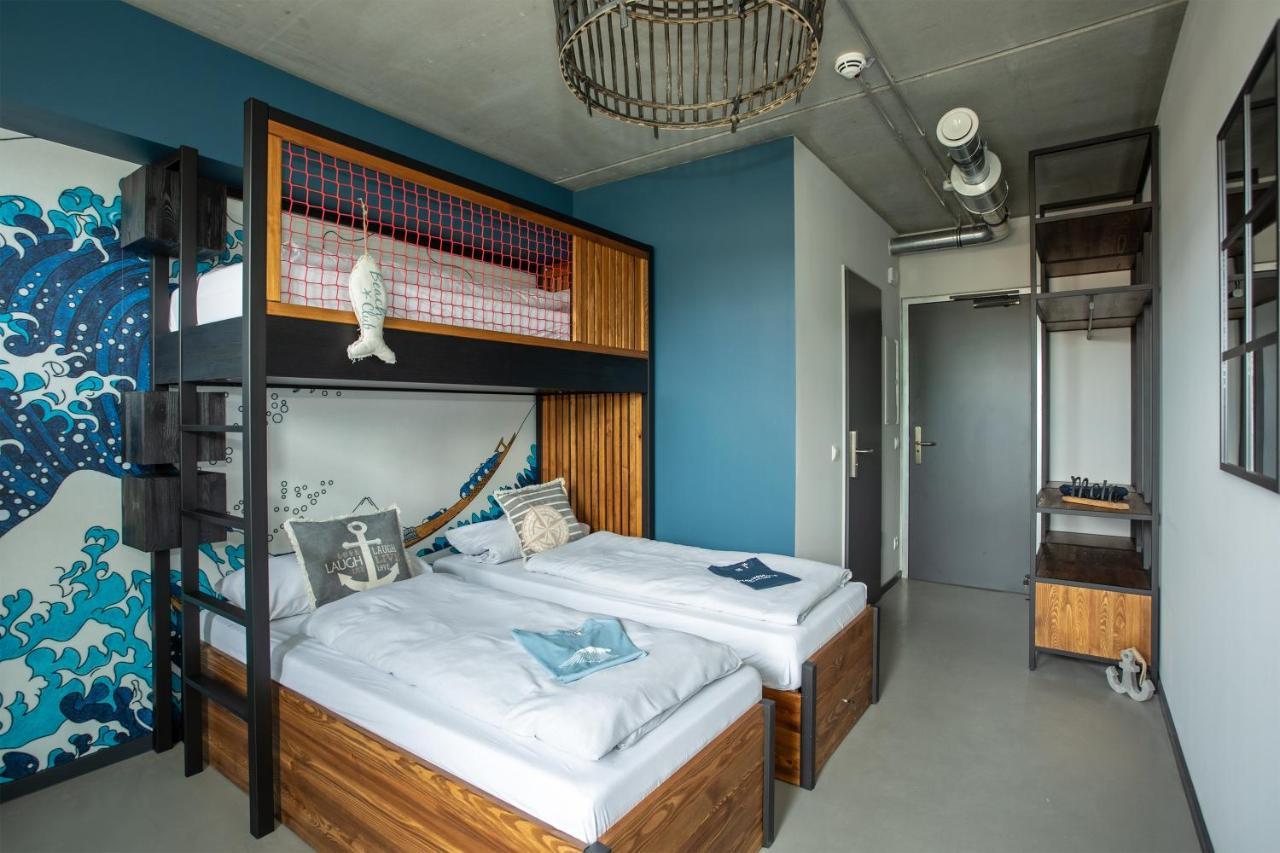 Dreibettzimmer mit Meerblick