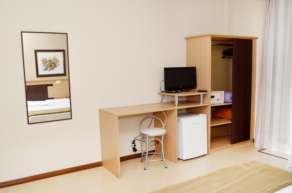 Quarto Triplo com Varanda