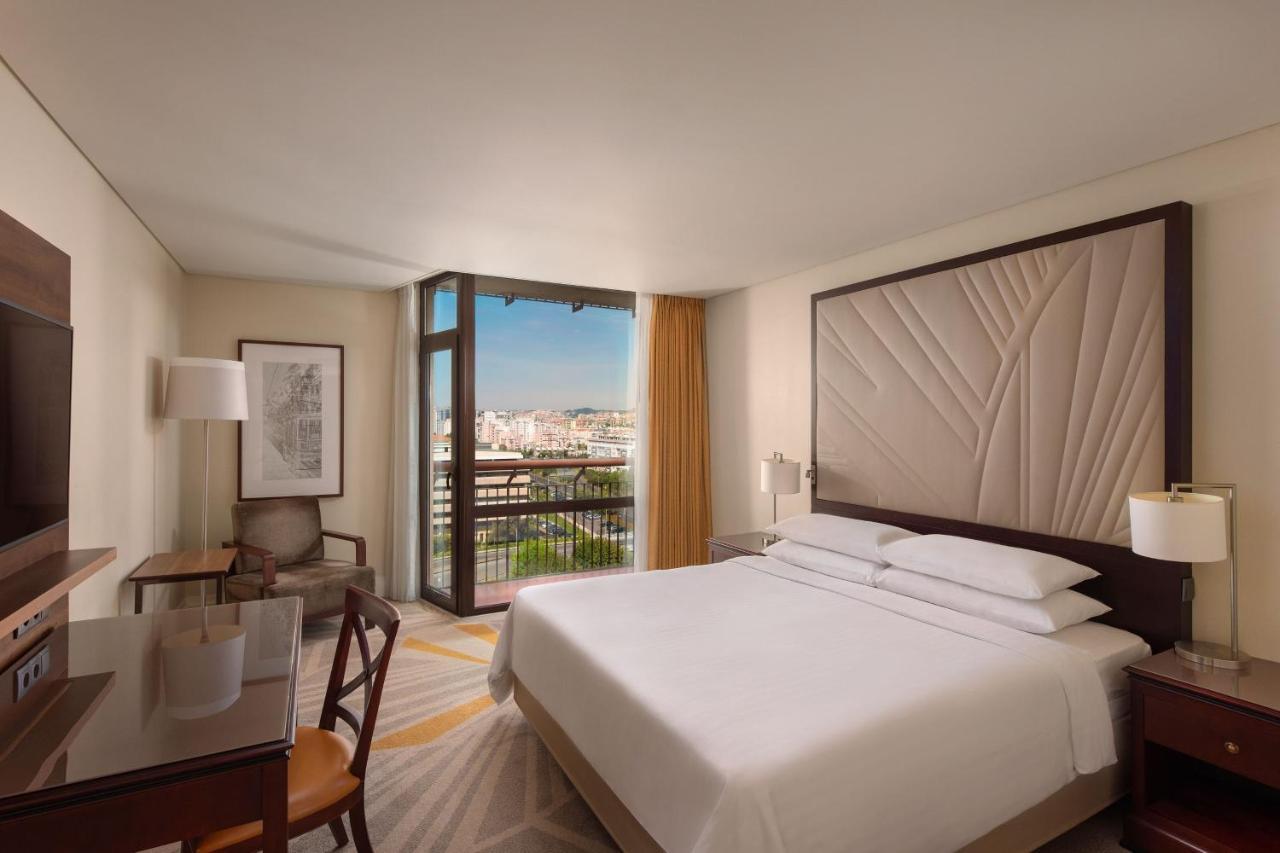 Quarto King com Vista Piscina e 1 Cama King-Size - Renovado