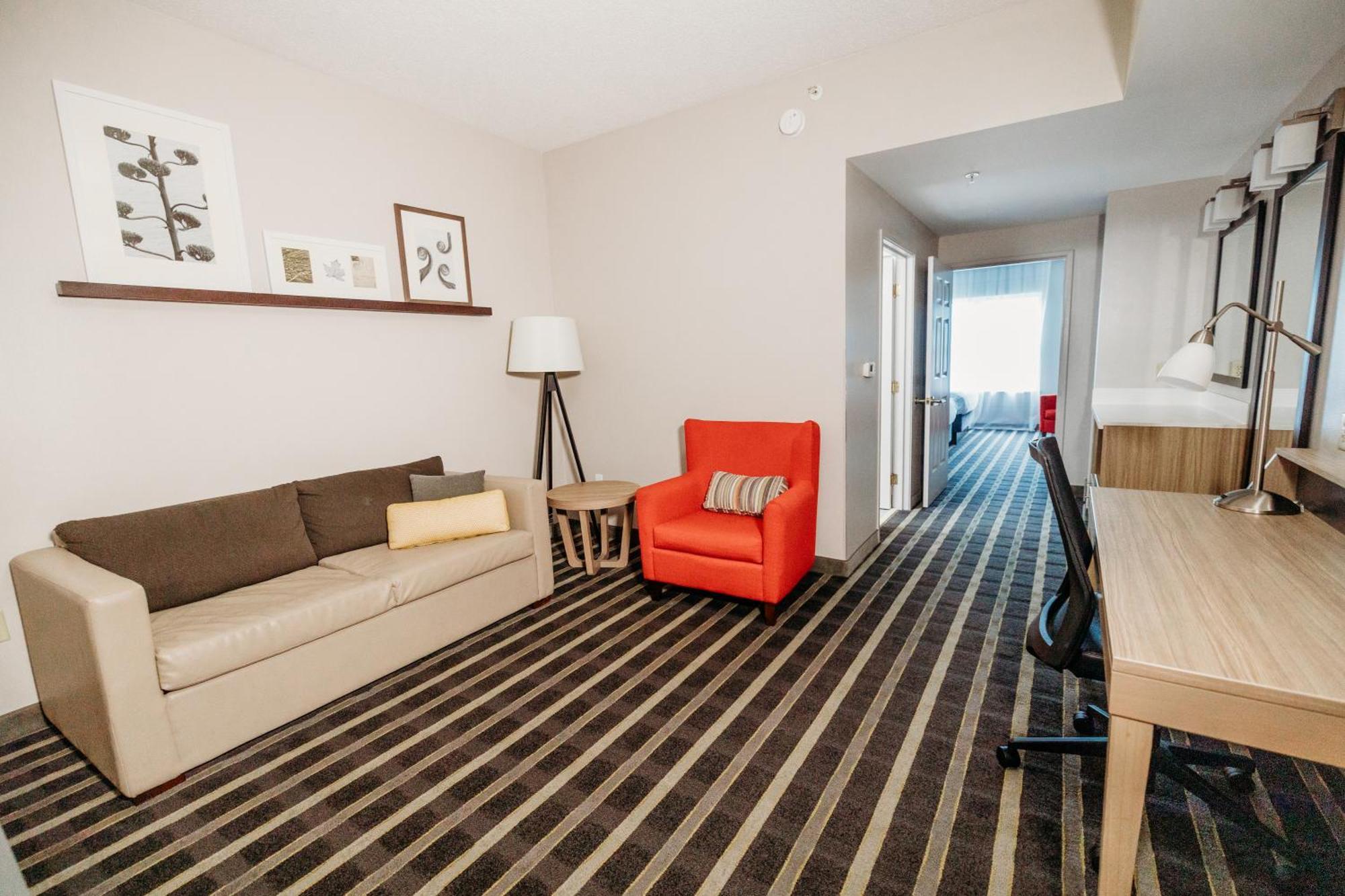 One-Bedroom Suite with Two Queen Beds, Sofa Bed and Roll-In Shower - Non-Smoking