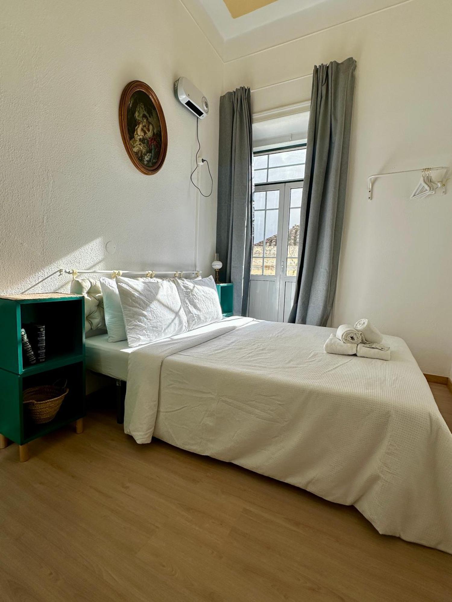 Quarto Duplo com Casa de Banho Partilhada