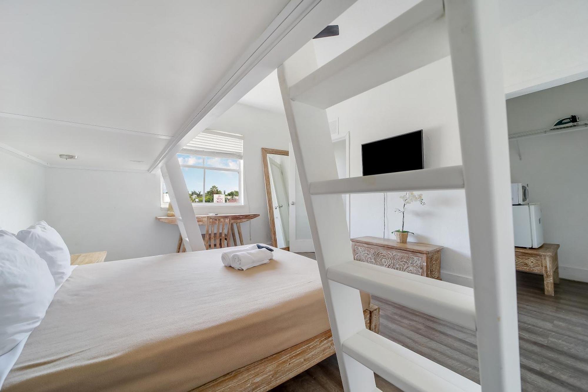 Family Room - Queen Bed and Two Twin Beds  (Self Check-in)
