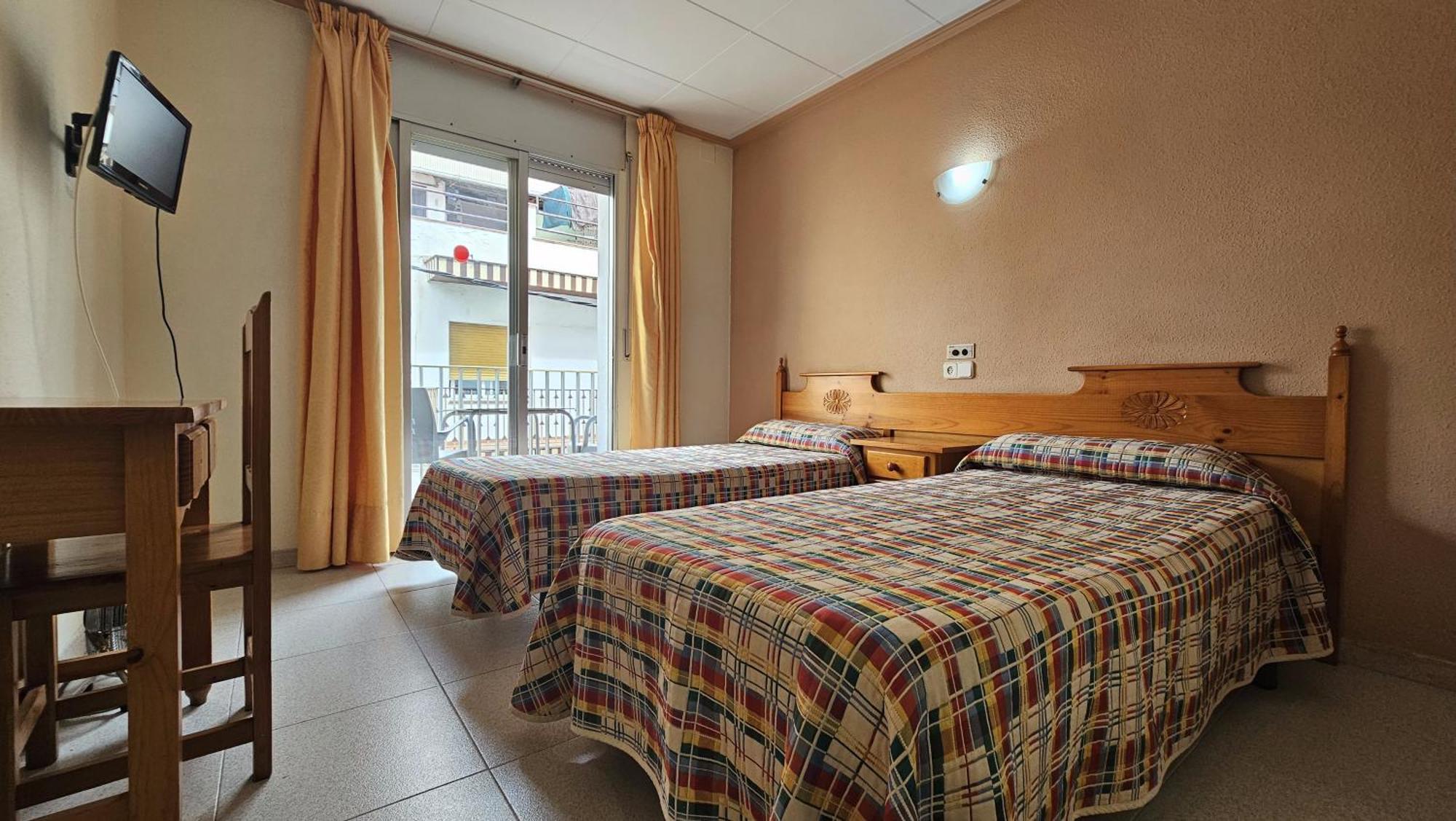 Tweepersoonskamer met 2 Aparte Bedden