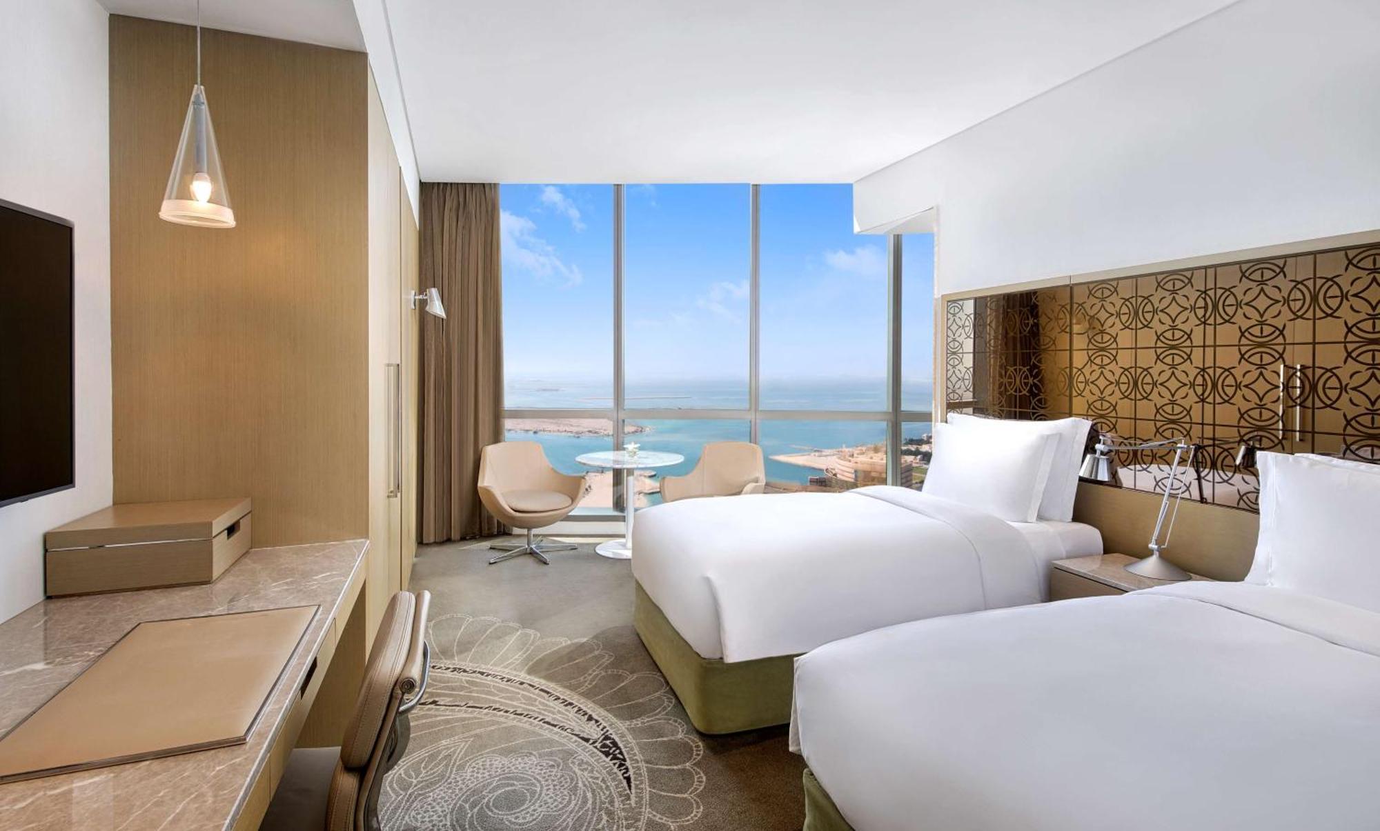 Quarto Família Deluxe Conjugado com Vista do Mar