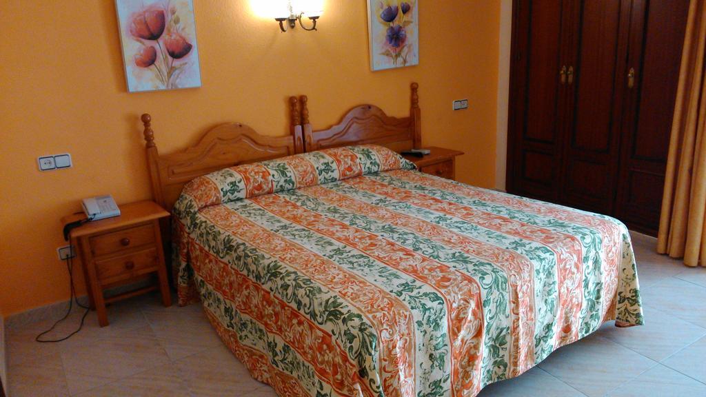 Kamer met Queensize Bed en Balkon