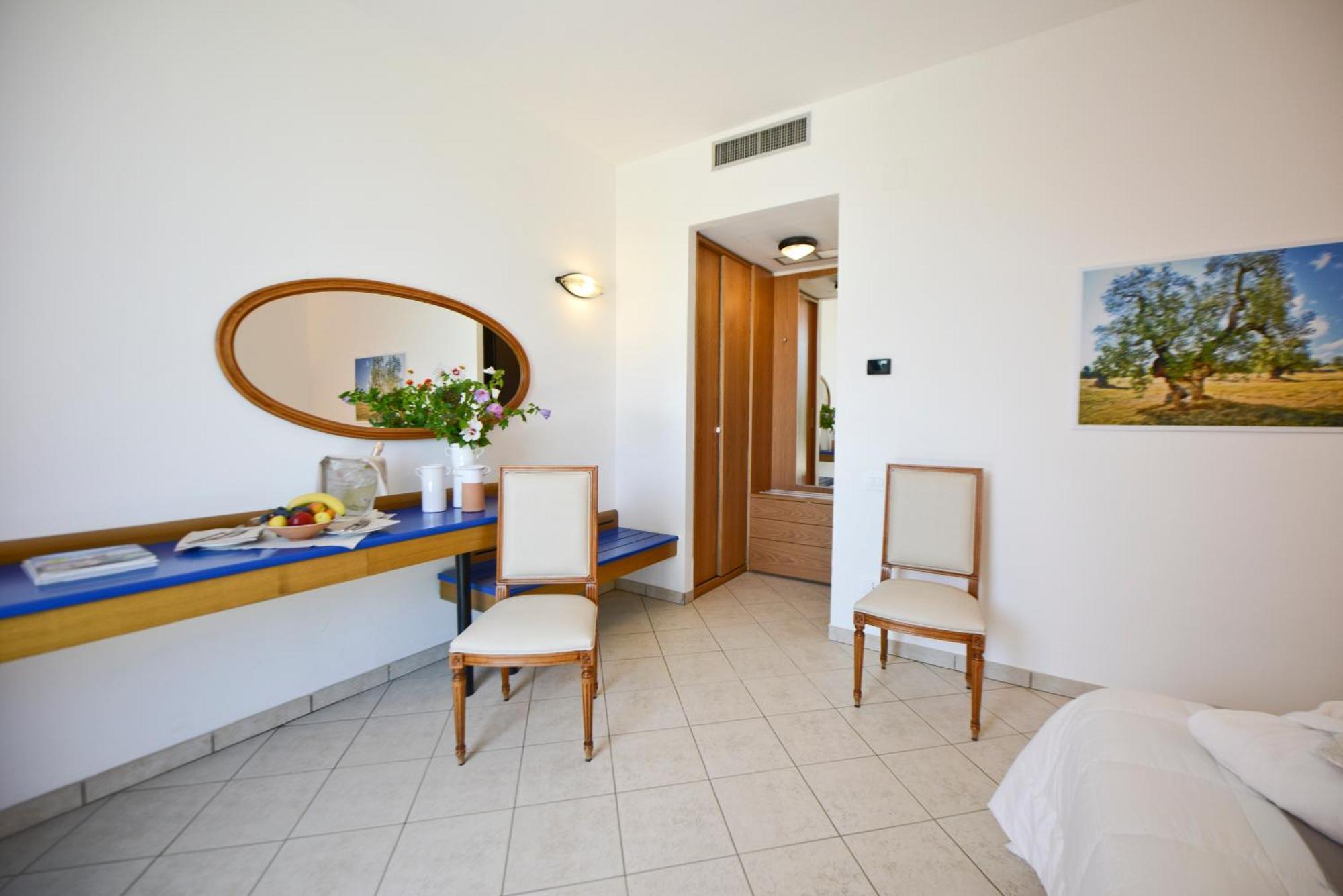 Camera Familiare con Vista Giardino